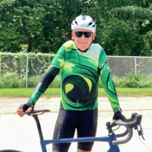 Mike Adsit posing with his bike.